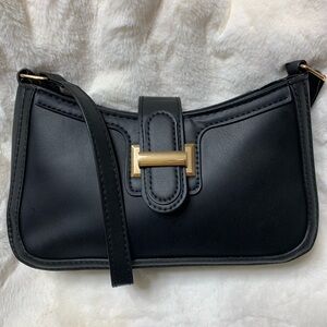 Chic Black Shoulder Bag with Gold Accent